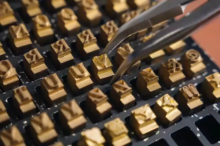EMBOSSED MONOGRAM