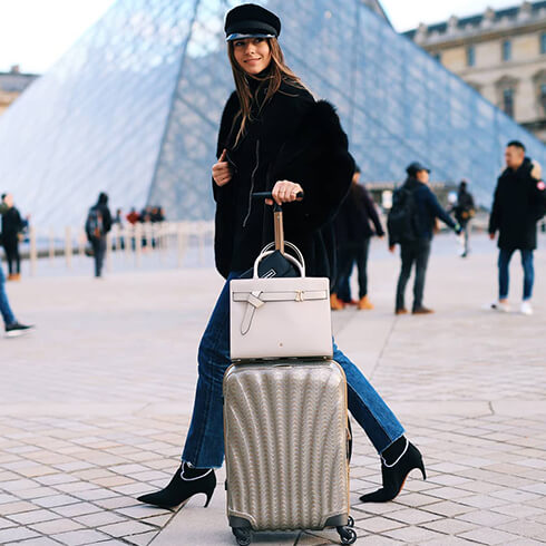 mysamsonite Leaving behind the Parisian atmosphere with @zinafashionvibe and her Limited Edition 10 Years Cosmolite case x My Samsonite handbag. #SamsonitexParis #PFW